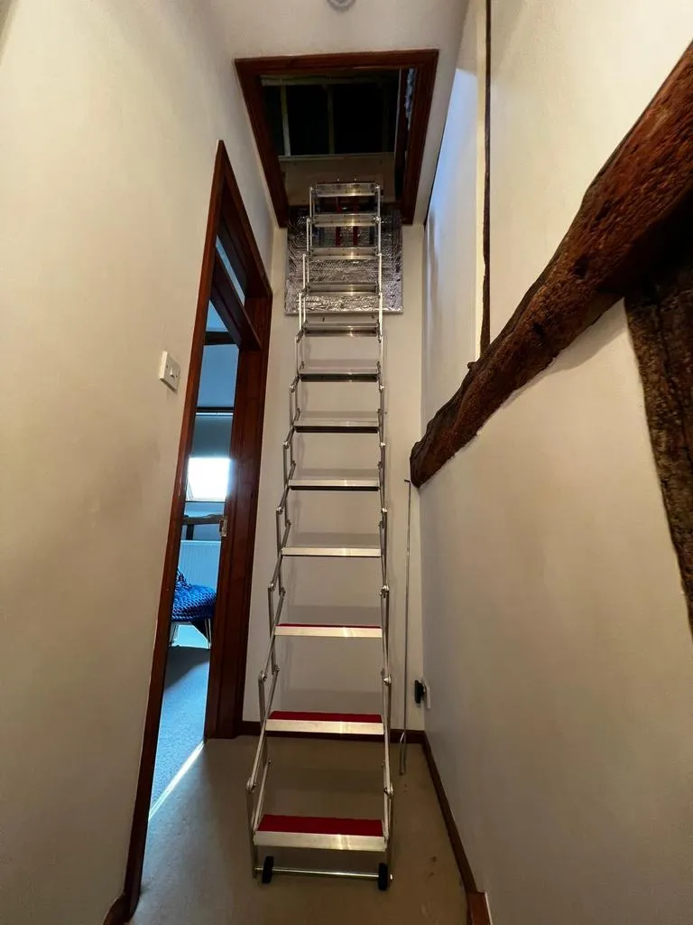 Loft ladder installed by TG Loft Boarding
