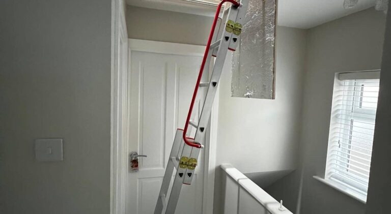 Insulated loft hatch fitted by TG Loft Boarding