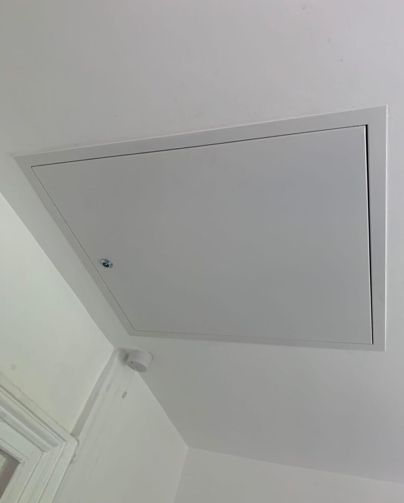 Insulated loft hatch fitted by TG Loft Boarding
