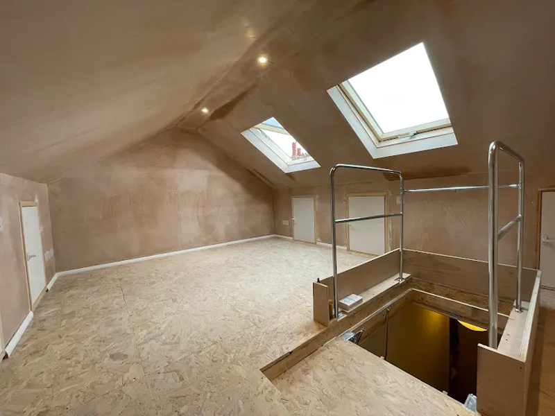 Converted loft room by TG Loft Boarding