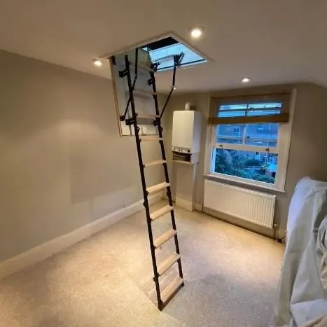 Oman timber loft ladder supplied and fitted by TG Loft Boarding