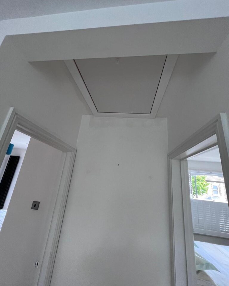 Insulated loft hatch fitted by TG Loft Boarding
