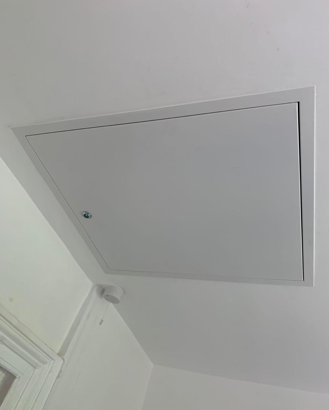 Insulated loft hatch fitted by TG Loft Boarding
