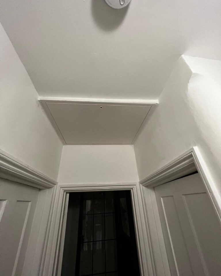 Insulated loft hatch fitted by TG Loft Boarding