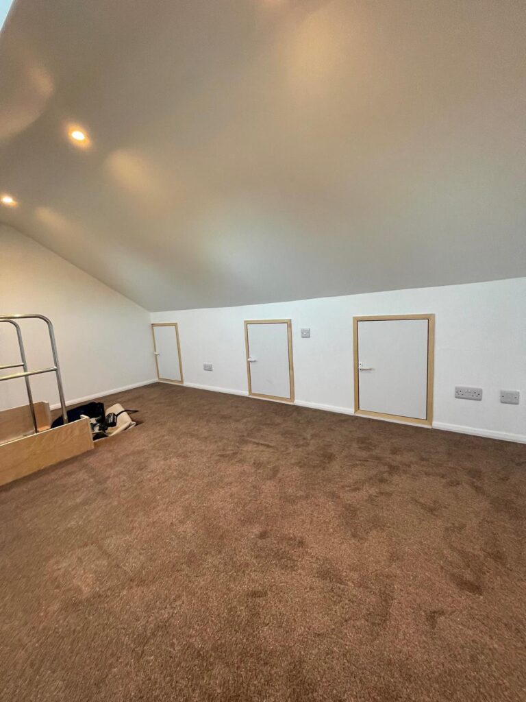 Loft room conversion by TG Loft Boarding