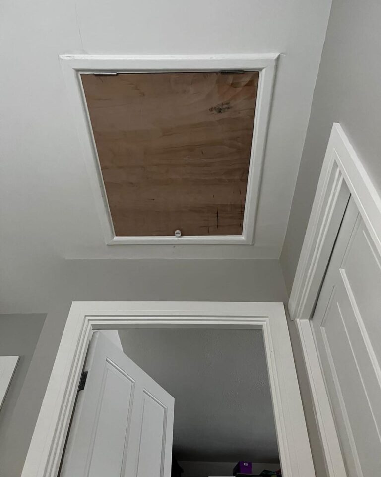 Insulated loft hatch fitted by TG Loft Boarding